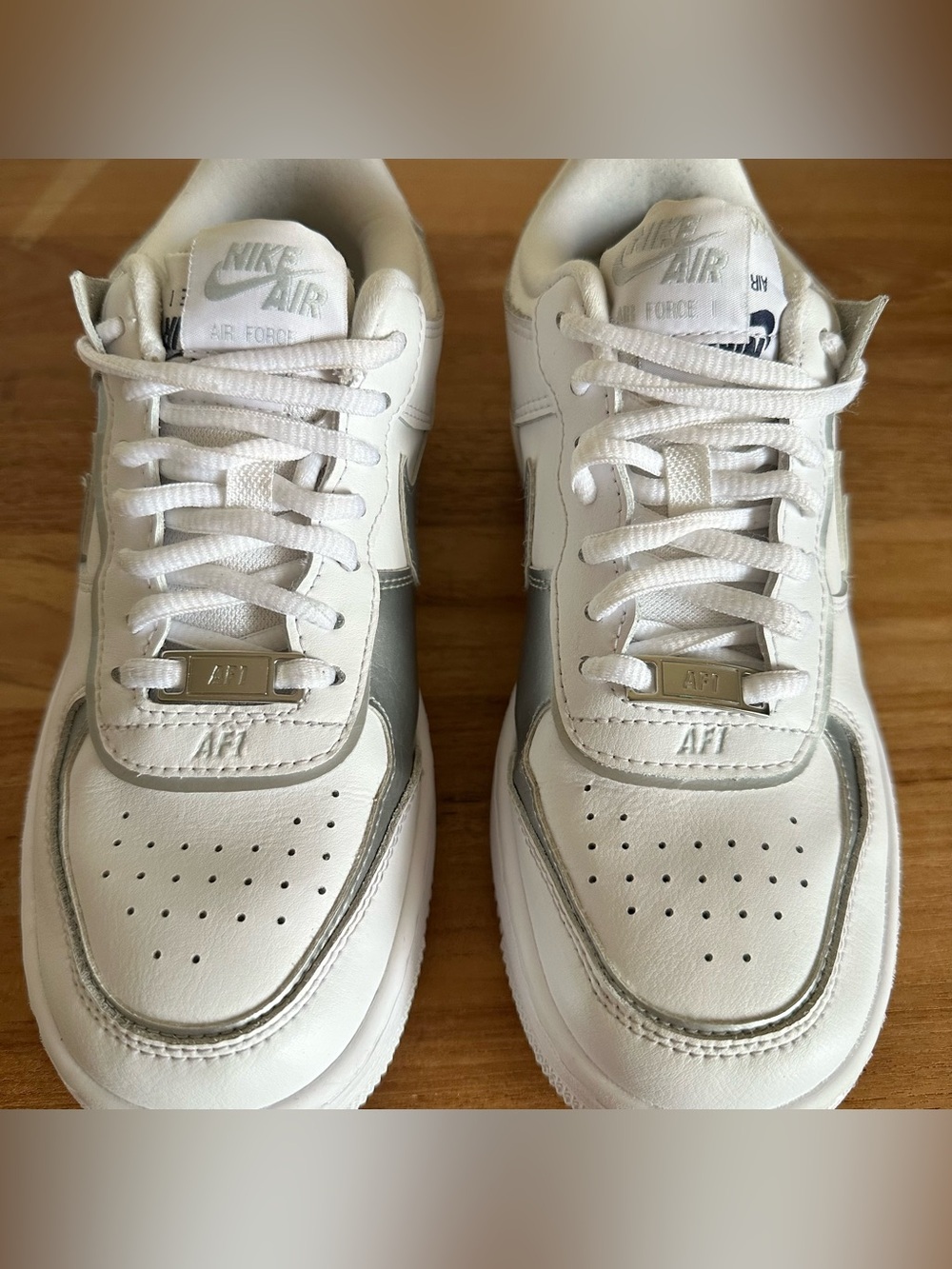 Nike White Sneakers with Metallic Silver Swoosh - Picture 5 of 11